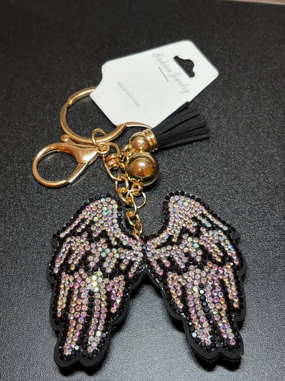 Gold-Tone Iridescent Crystal Angel Wing Keychain with Black Tassel